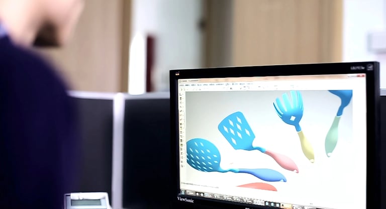Designer showing his design work in front of computer