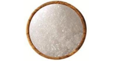 Decorative pink salt block on wrought iron stand for kitchen or wellness room display