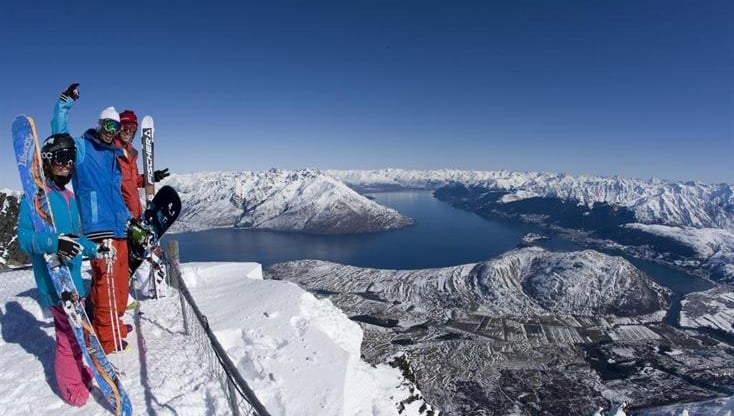  skiers standing on a snowy mountain in Queenstown, New Zealand
