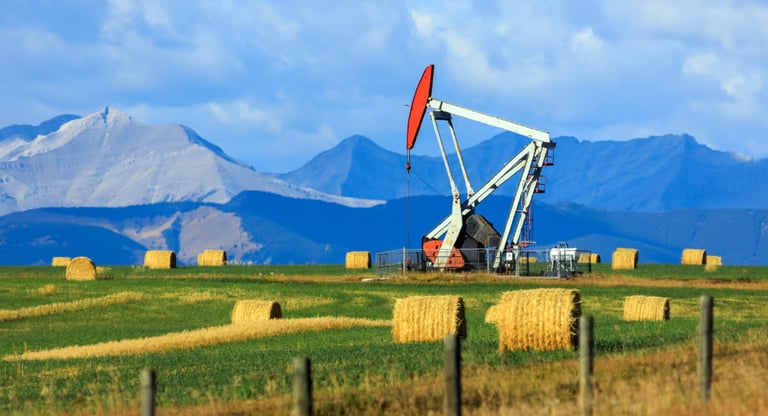 An oil pumpjack in Alberta, Canada, operating a reciprocating piston.