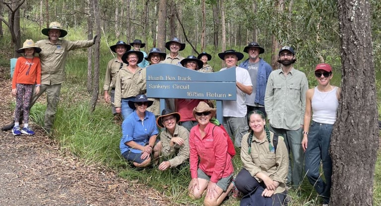 Bushcare volunteers pose for group photo in the reserve