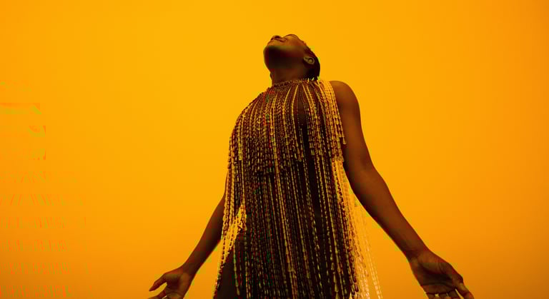 a woman with a long braid hair and a long dress