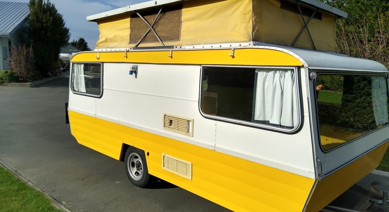 Retro 1980s "little yellow" poptop caravan