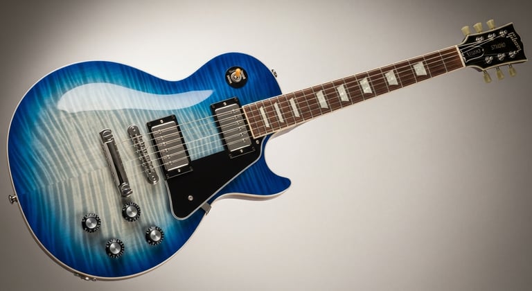 Gibson Les Paul Studio electric guitar in a striking blue burst finish with chrome hardware.