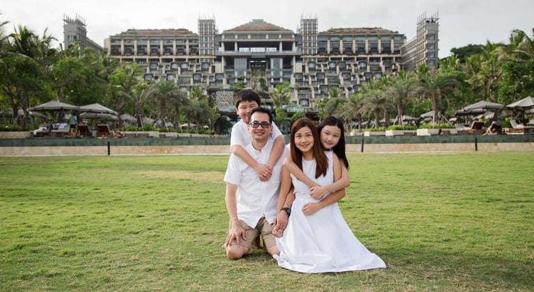 Elegant family portrait during a luxury family photography session at Kempinski Bali resort