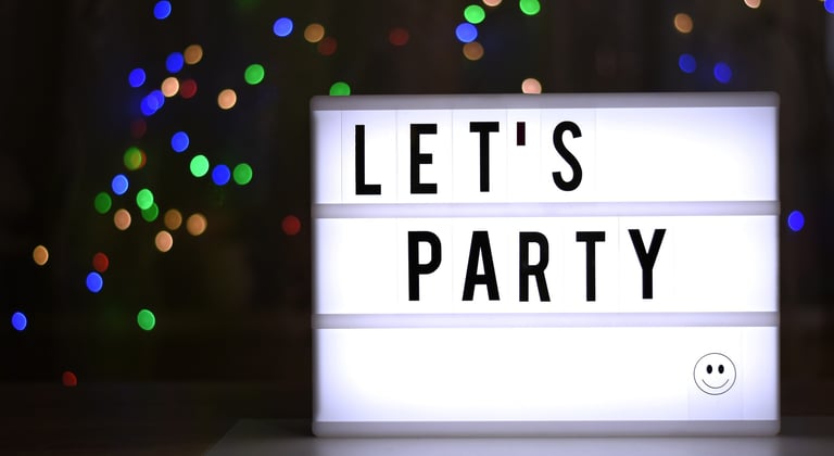 a light board that reads let's party