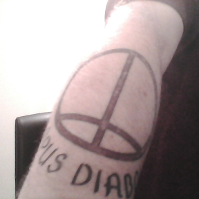 Inverted symbol of Opus Dei, with text below "Opus Diaboli"