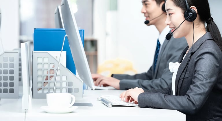 a woman in a headset with a headset and a man in a suit