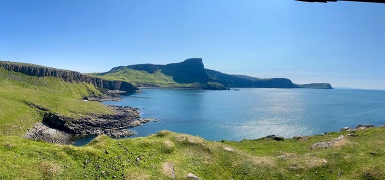 Neist Point with a view of a mountain range