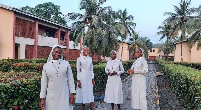 Missionary Sisters of the Divine Image walking together on convent grounds