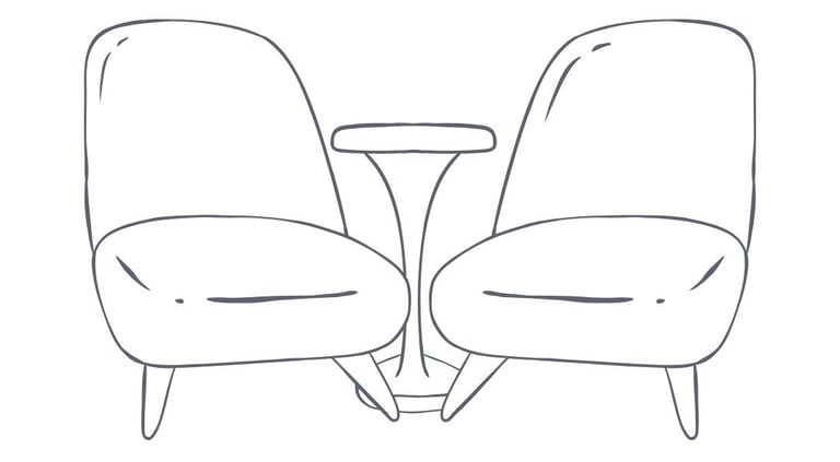 a pair of chairs with a table, a visual representation of the compatibility of NLP and Hypnotherapy