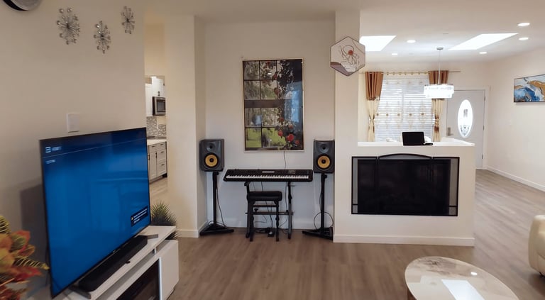 Adult family home with modern amenities including bedrooms, kitchen, accessible bathrooms, and cozy living areas