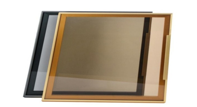 Two modern glass serving trays with metal frames - one in gold and one in black, ideal for home decor and entertaining