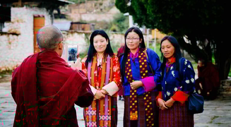 Bhutanese-Women-Getting-Ready-For-A-Quick-Pose-At-Jambay-Lhakhang-Drub-Festival