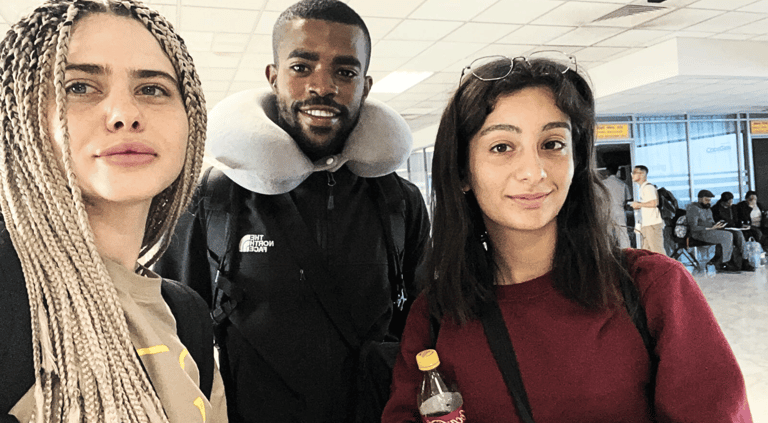 Group of happy tourists using Colombo Airport transfer service in Sri Lanka