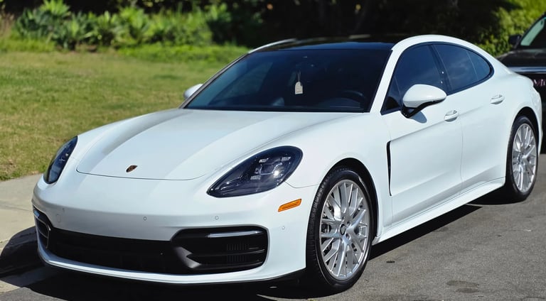 Professional mobile auto detailing in North County San Diego featuring a freshly detailed white luxury sedan.