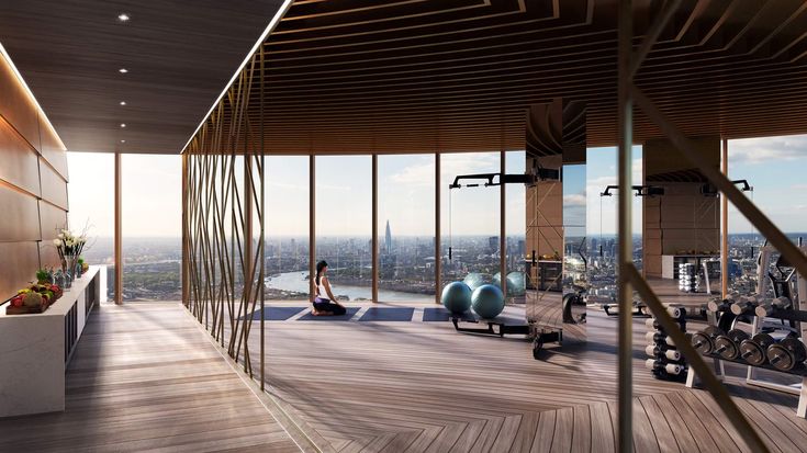elegant hotel gym rooftop with city views