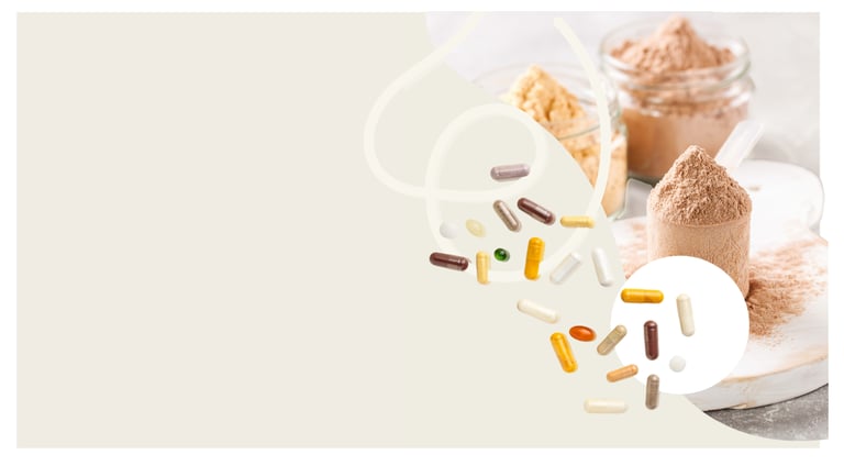 Assorted dietary supplement capsules and protein powder scoops for health and wellness.