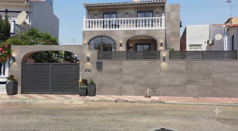 from the impressive entrance gate and privacy screens to the modern lighting fixtures.