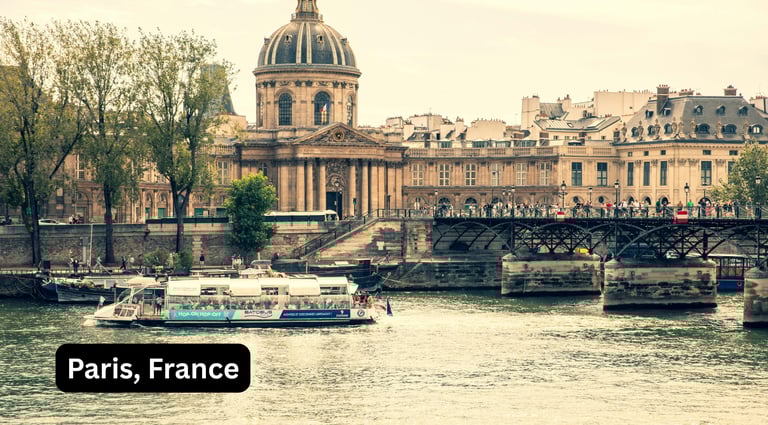 A beautiful day view of the Institut de France and the Pont des Arts bridge along the Seine River in