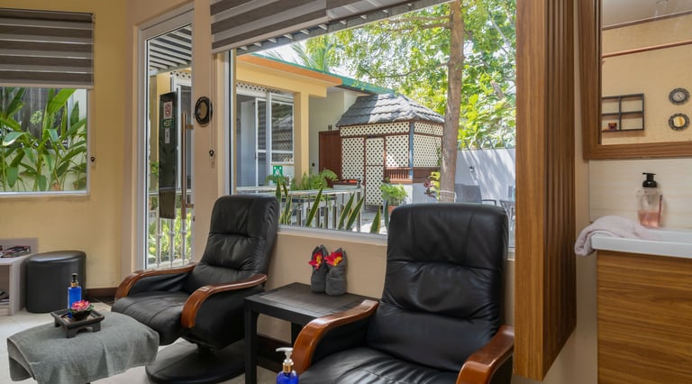 a living room with a view of a bathroom