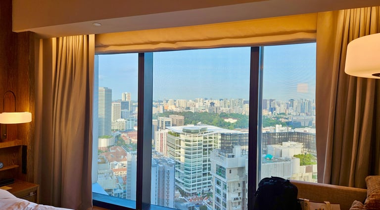Andaz Singapore room floor-to-ceiling windows with city skyline view