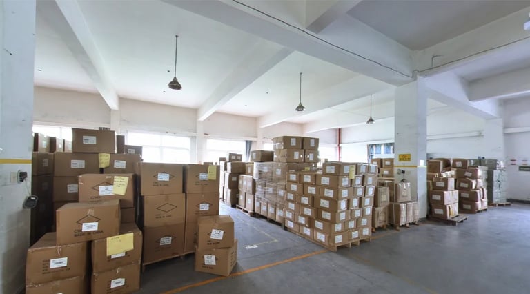 Goods are neatly arranged on the shelves in the factory warehouse, with clear labels
