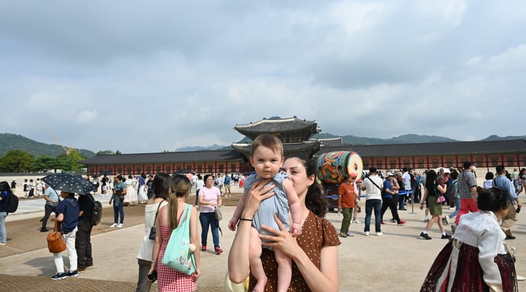 a woman holding a baby