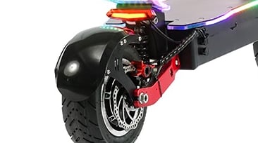 a scooter with a colorful colored lights on it