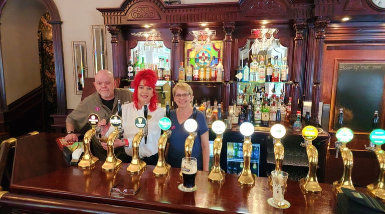 Pouring a pint at Christys Bar in Ireland