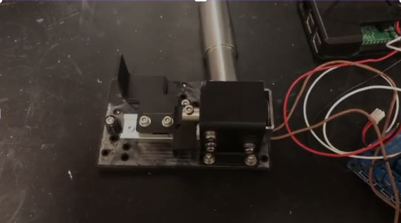 Compact laser safety shutter for industrial applications