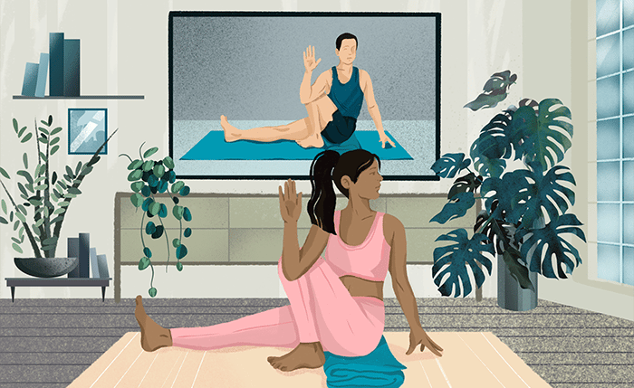 Woman practicing online yoga from home in dubai ksa uae