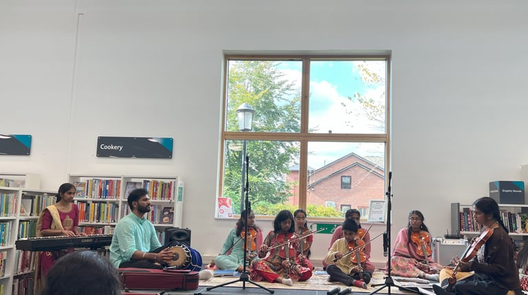 A picture of children performing in library