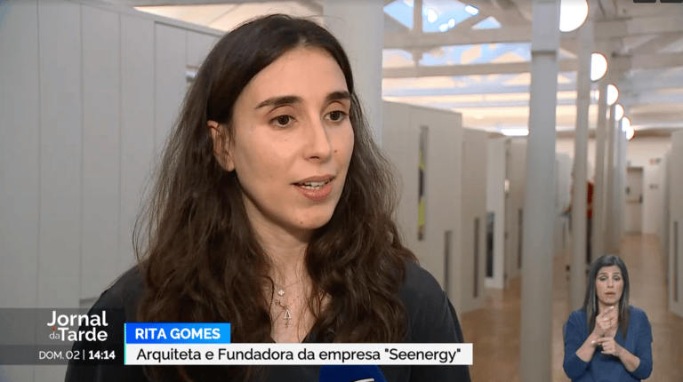 a woman in a black shirt and a microphone
