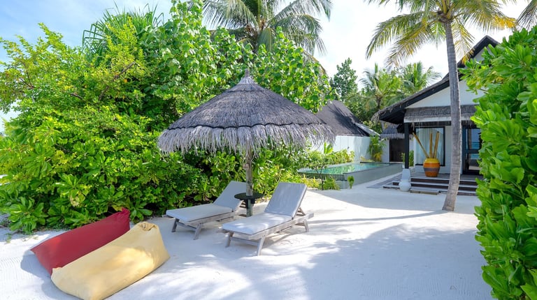 Ozen Life Maadhoo Maldives beach earth villa with pool