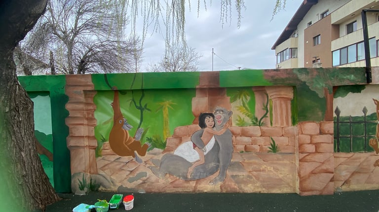 Pictură gard Cartea Junglei Mowgli.