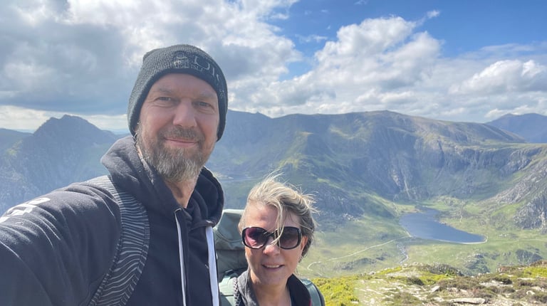 Nick and Tracey Billington at the summit of the Carnedd mountains, Snowdonia, Wales