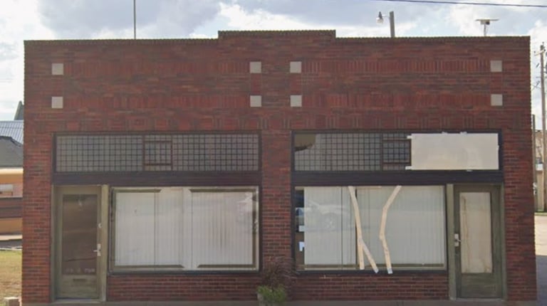 photo of building exterior  in disrepair