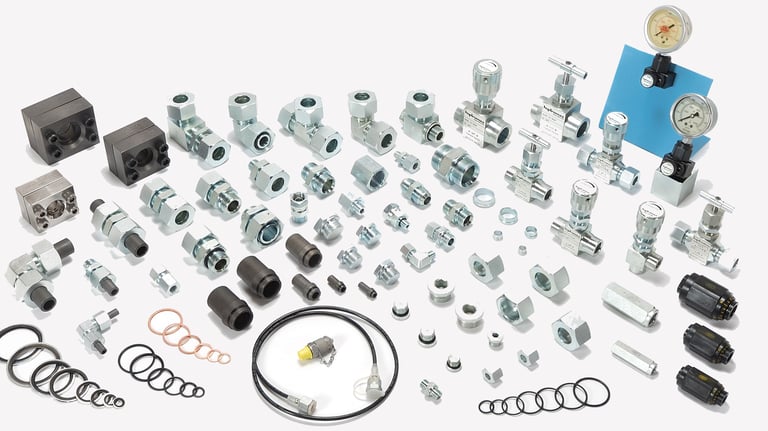 Photograph of hydraulic Ermetto fittings & accessories, versatile components utilized in hydraulics