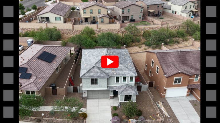 a video game of a house with a video game on the screen