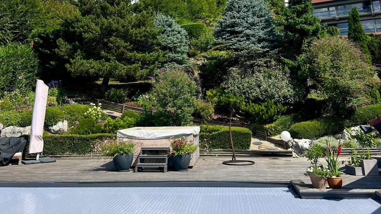 <img src="entretien-jardin-talloires.jpg" alt="Entretien complet de jardin paysager à Talloires avec