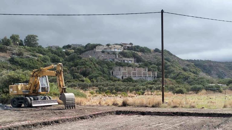 Bulldozer leveling a field