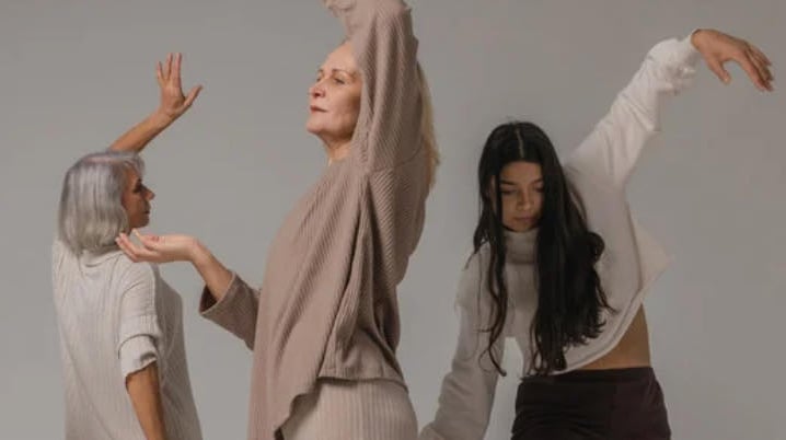 a group of women in a group of four poses