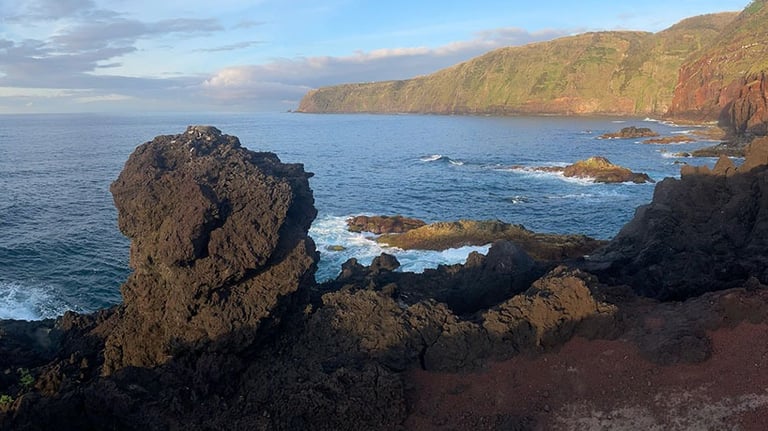 the view on a rocky cliff overlooking the ocean