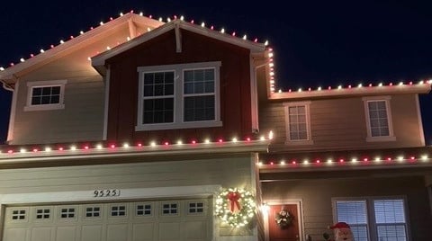 Christmas Lights on house eave in Peyton Colorado