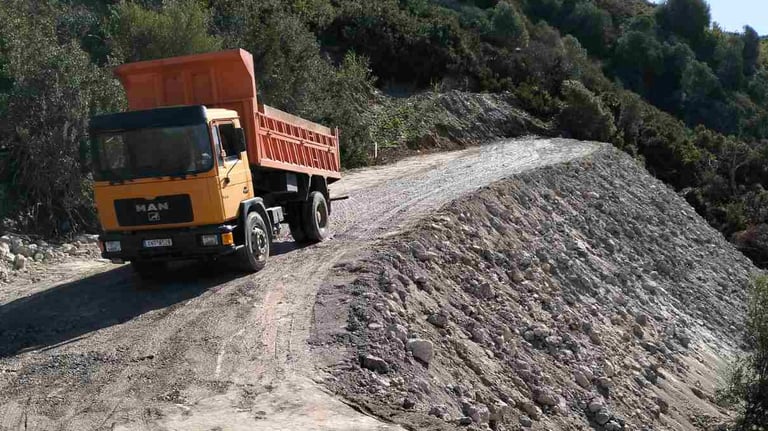 Truck driving on a dirt road