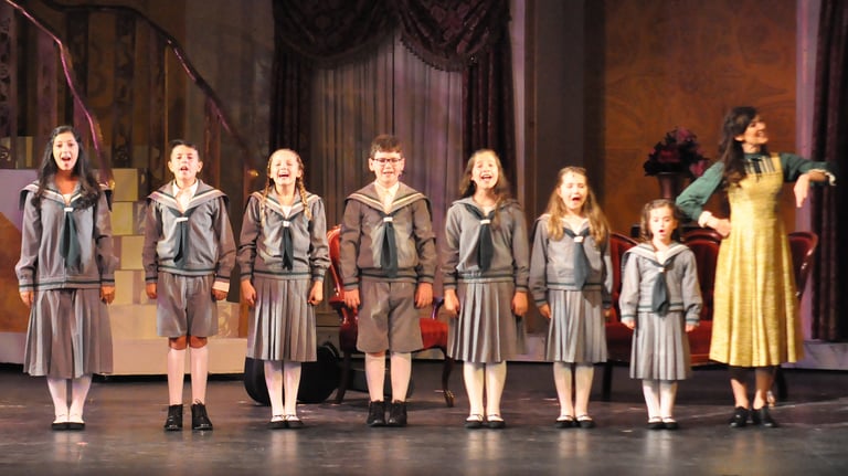 a group of people standing on a stage