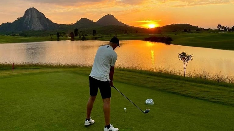 Man on golf course in Thailand holiday curated by Francesco Luxury Travels Villas Weddings