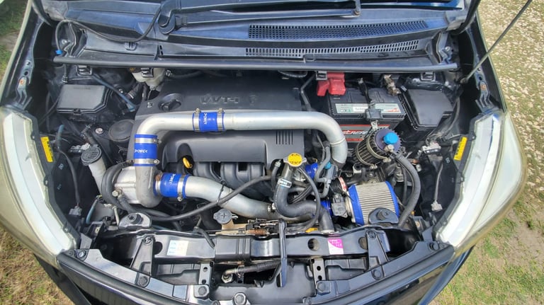 engine bay of supercharged vitz gs