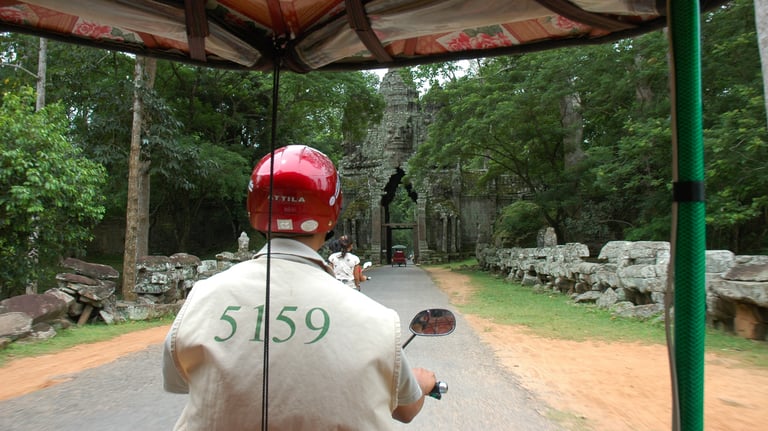 Tuk tuk driver at the Temples of Angkor, Siem Reap, Cambodia